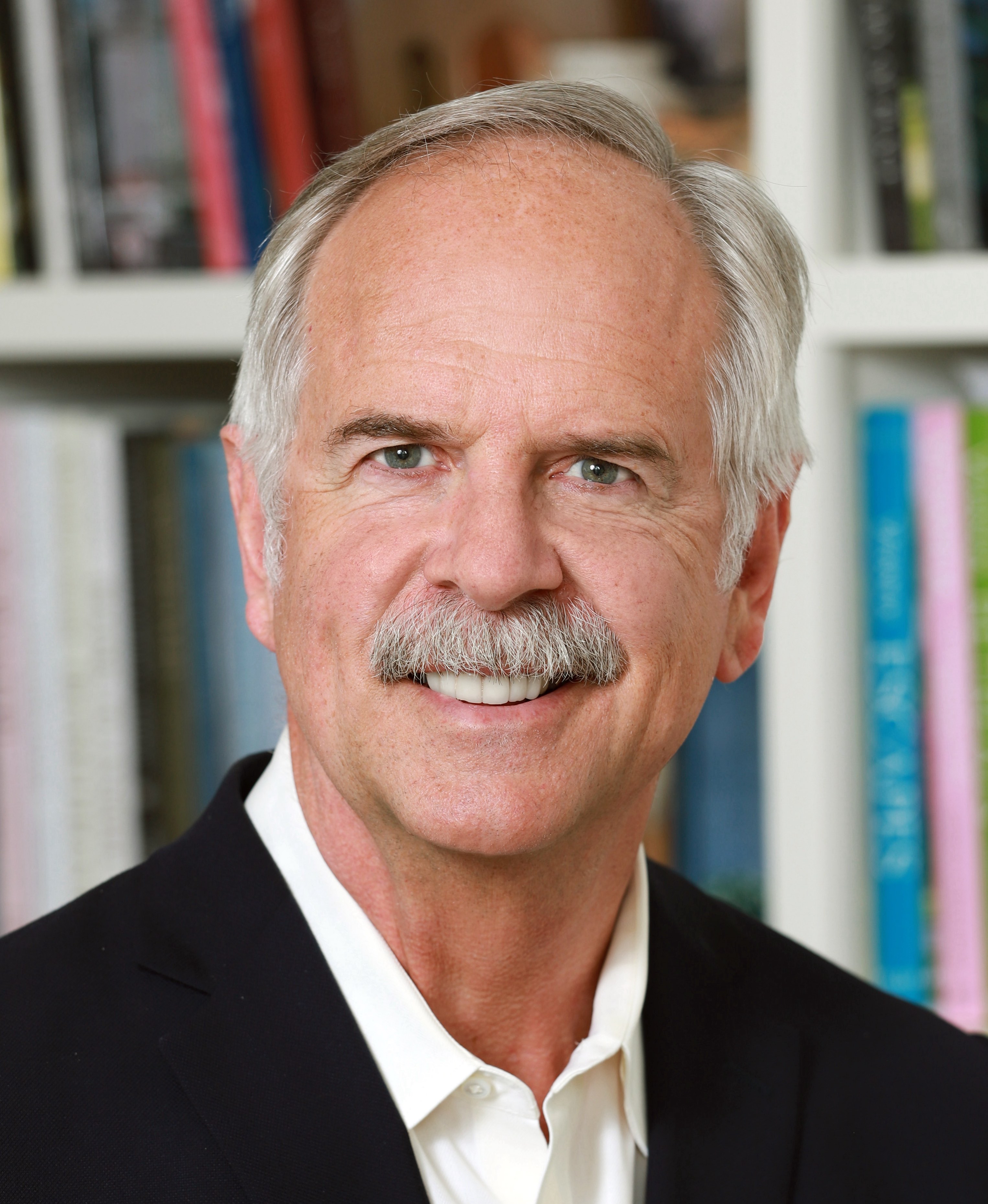 2020_JN_headshot_w_books_very_small_copy_John_Naber.jpg